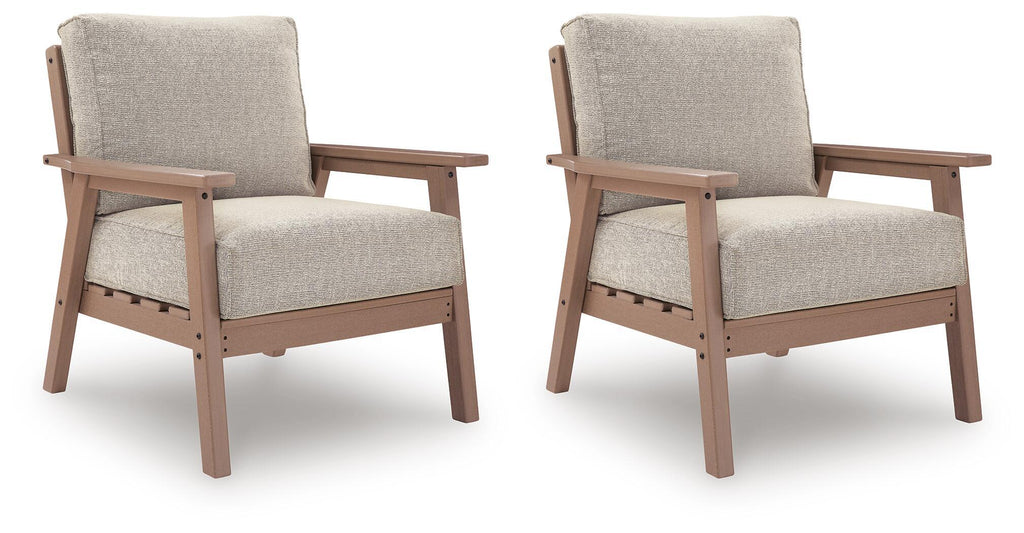 Set of 2 lounge chairs with beige upholstered cushions and light driftwood wood frames