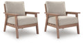Set of 2 lounge chairs with beige upholstered cushions and light driftwood wood frames