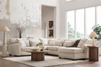 Light beige sectional sofa with chaise corner and patterned throw pillows, dark lumbar pillow