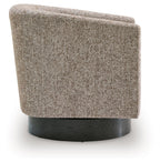 Gray upholstered accent chair, side view with rounded back and black circular base