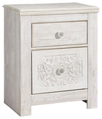Whitewash wood nightstand with two drawers, round knobs, carved lower drawer front