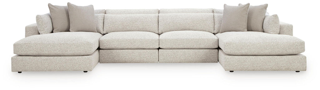 Beige sectional sofa with chaise ends and corner section, squared arms and back cushions
