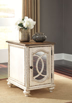 Whitewashed chair side end table with inset oval mirror door and short legs