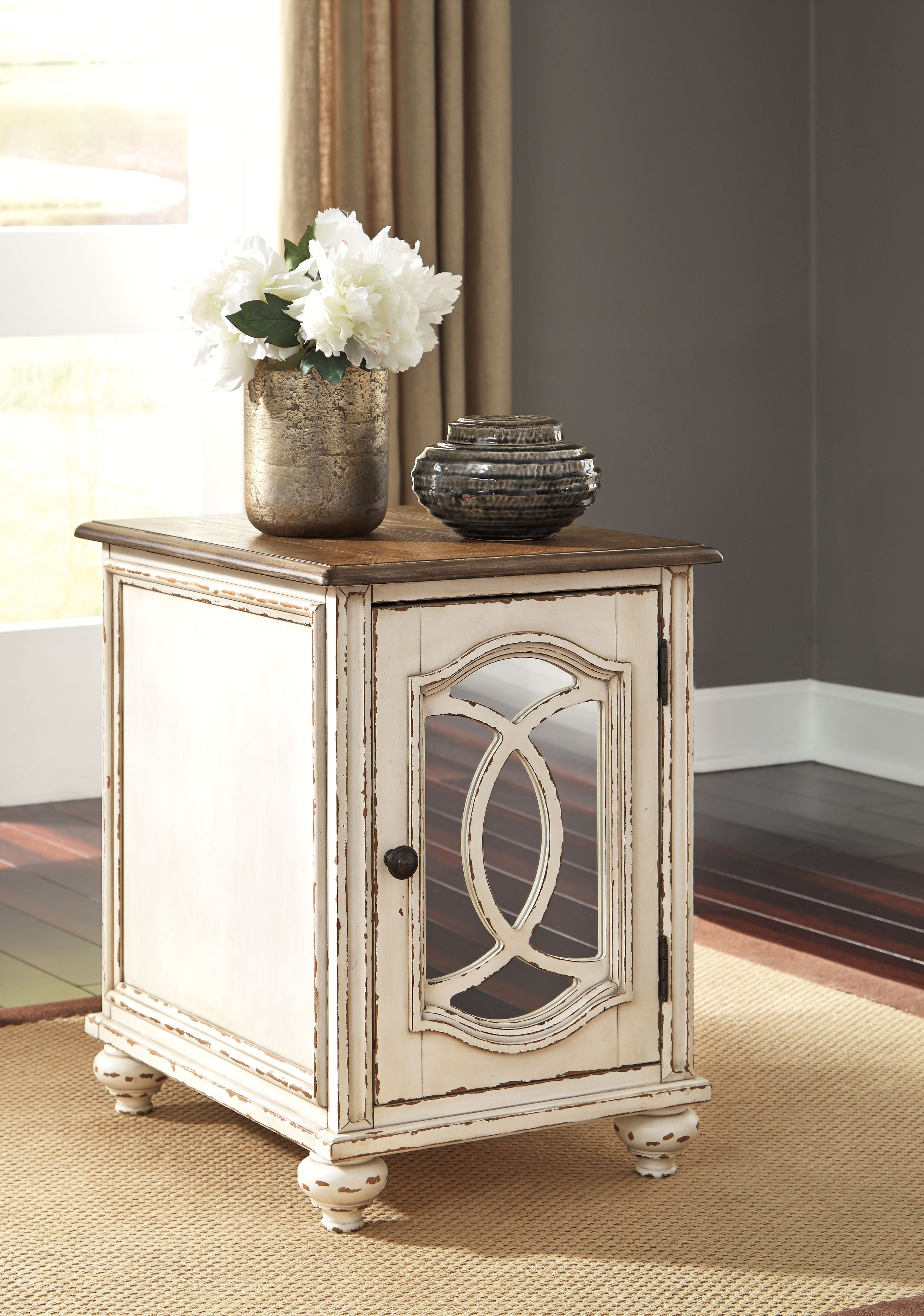 Whitewashed chair side end table with inset oval mirror door and short legs