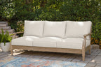 Carter Hall beige sofa with three back cushions and padded seat cushions