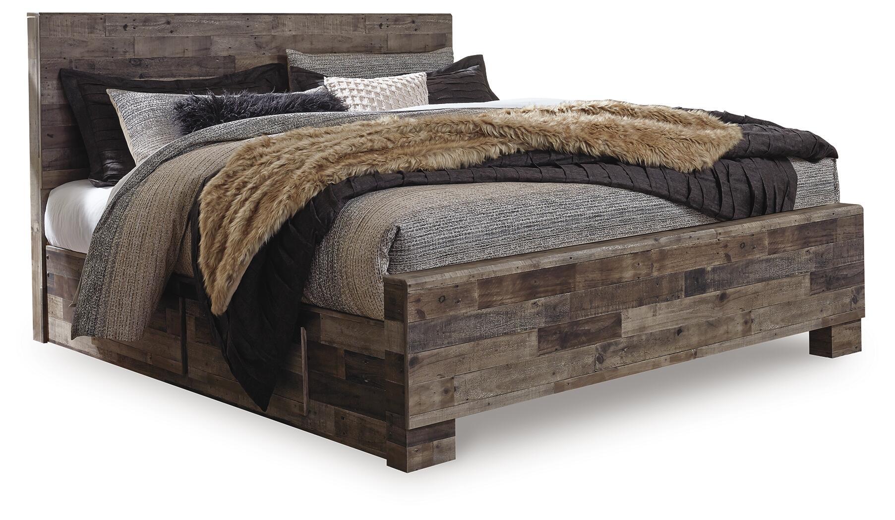 Dark wood panel bed with gray upholstered frame and black-and-beige layered bedding