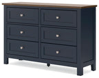 Front view blue dresser with six drawers and round silver knobs