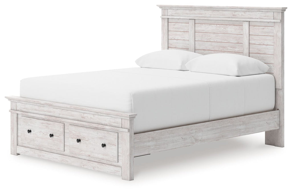 White wood panel storage bed with slatted base and front drawer storage