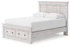 White wood panel storage bed with slatted base and front drawer storage