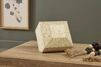 Beige speckled angular sculpture with tapered top, standing display piece