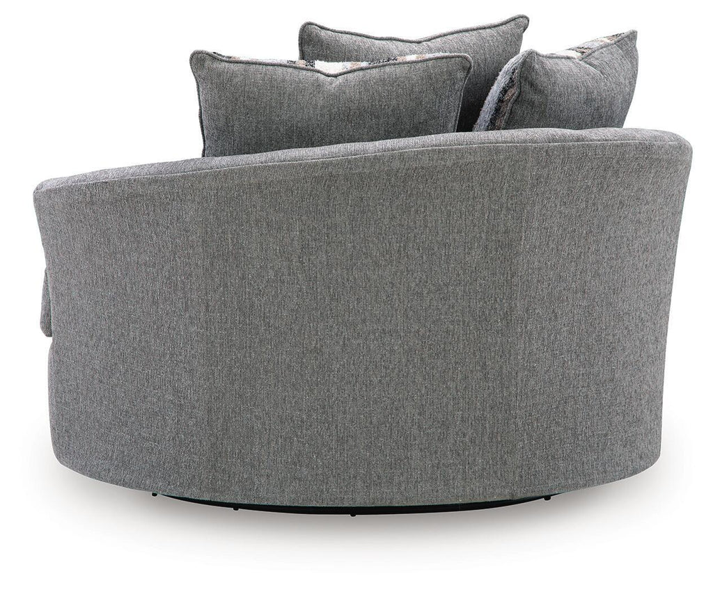 Gray upholstered swivel accent chair with padded back and broad armrests