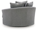 Gray upholstered swivel accent chair with padded back and broad armrests
