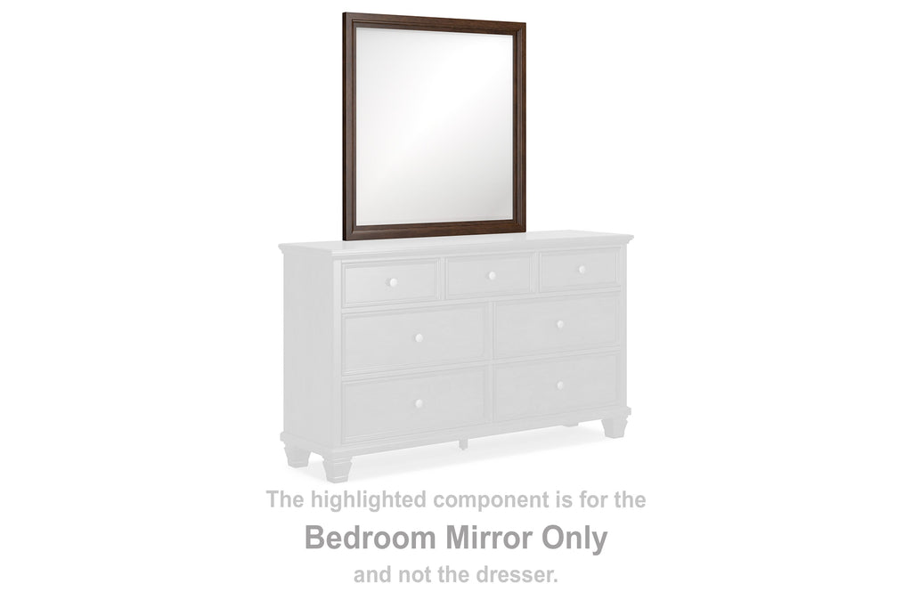 Brown rectangular bedroom mirror with slim frame, shown above a white dresser