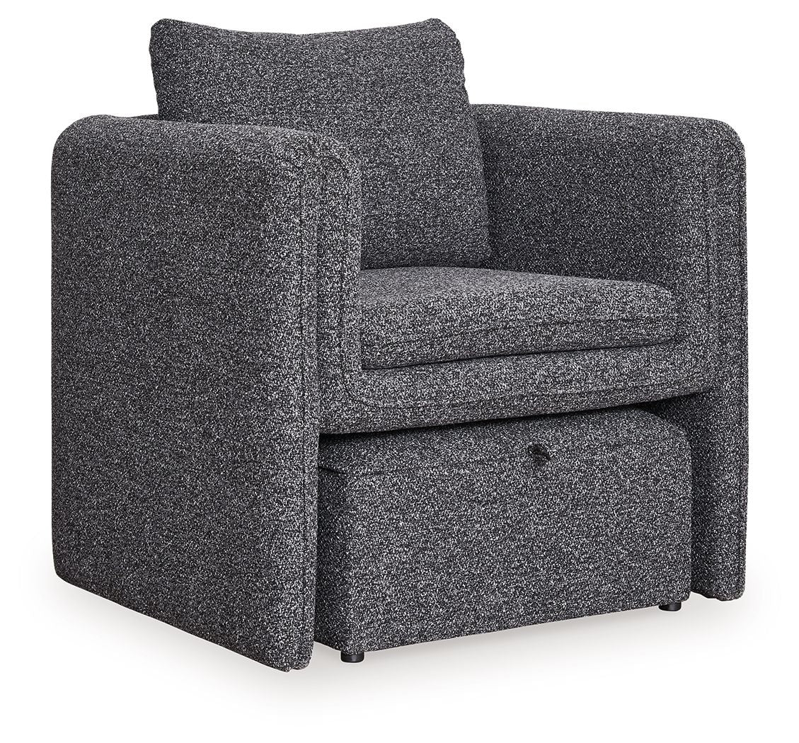 Charcoal accent chair with ottoman, textured upholstery, padded arms and backrest