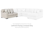 Light beige left-arm facing loveseat, visible in corner sectional layout, with seat cushions.