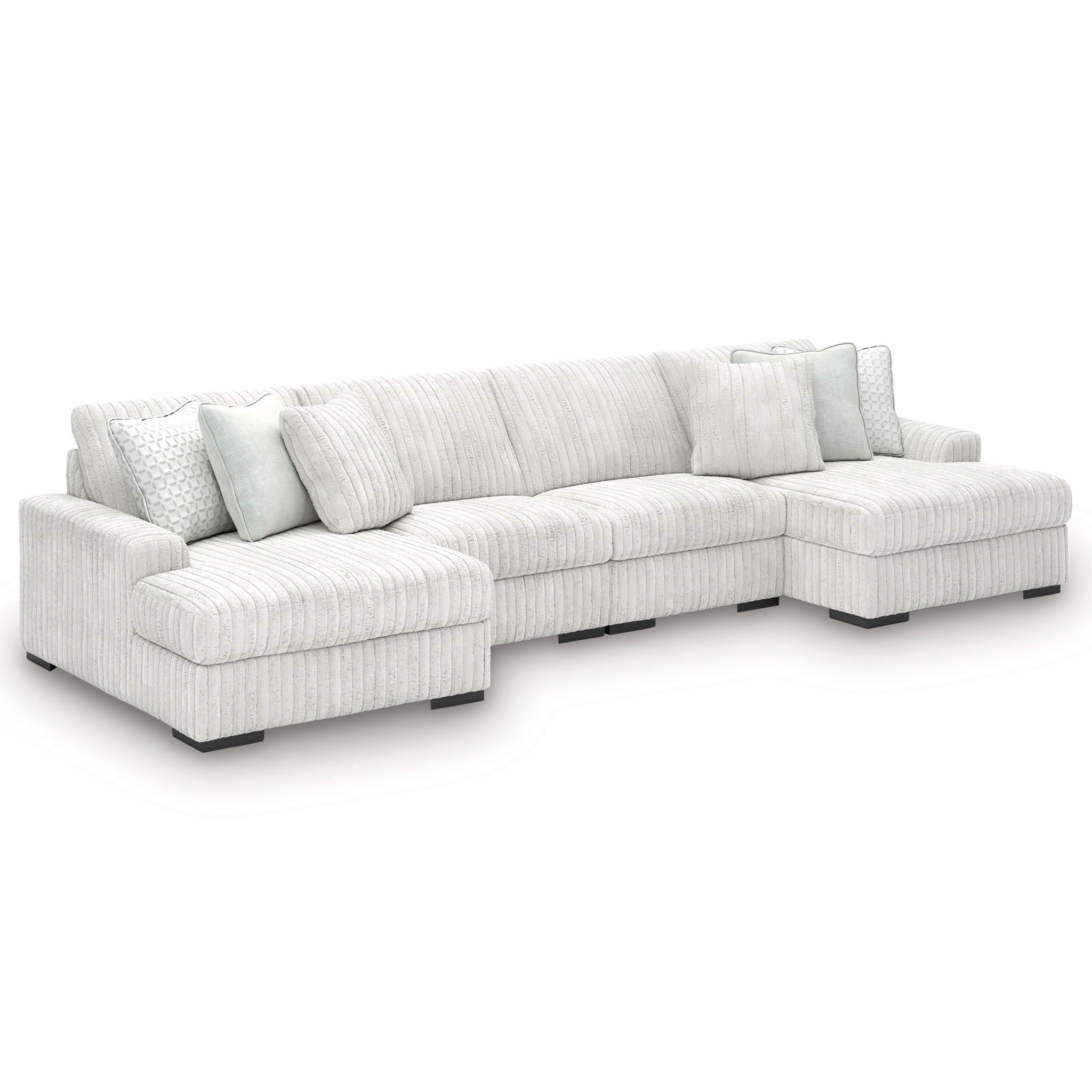 Off-white striped sectional sofa with chaise corner and thick seat cushions.
