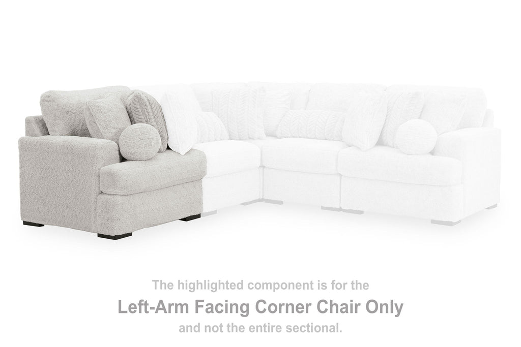 Corner chair section, left-arm facing, arctic light-gray fabric with rounded accent pillows