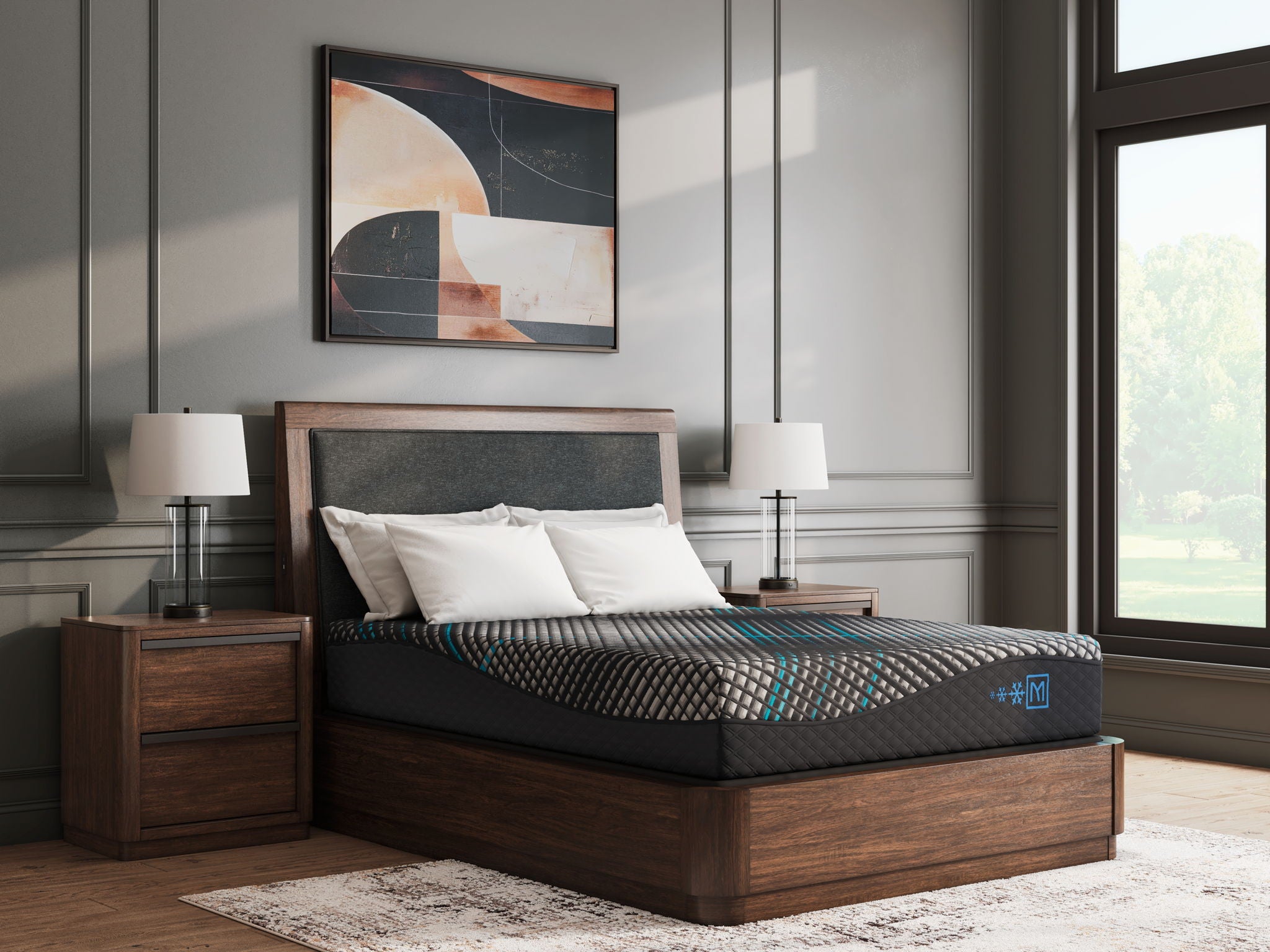 Black foam mattress with patterned top and turquoise border accents in bed setting