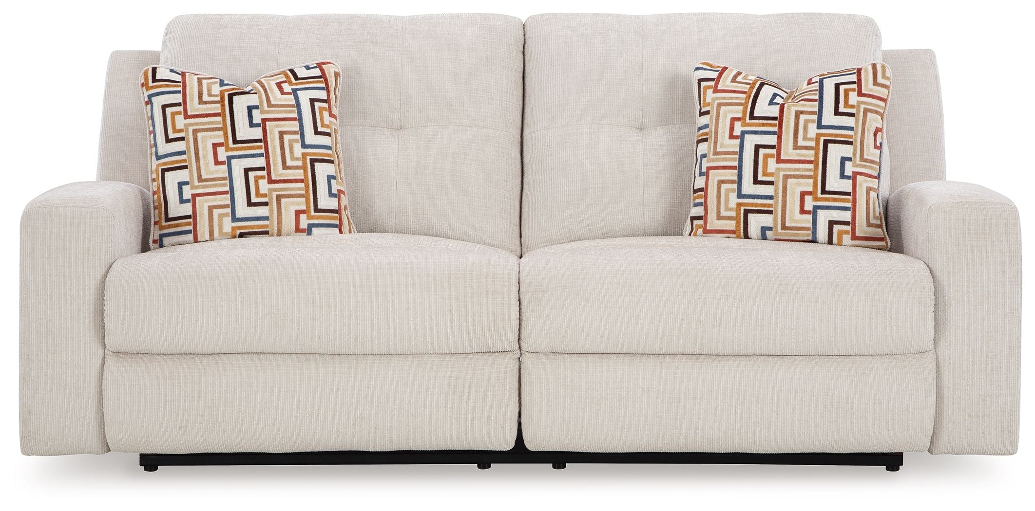 Stone 2-seat reclining sofa with two seat sections and geometric pattern pillows