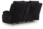 Onyx corduroy double reclining loveseat with tufted arms and vertical channel stitching