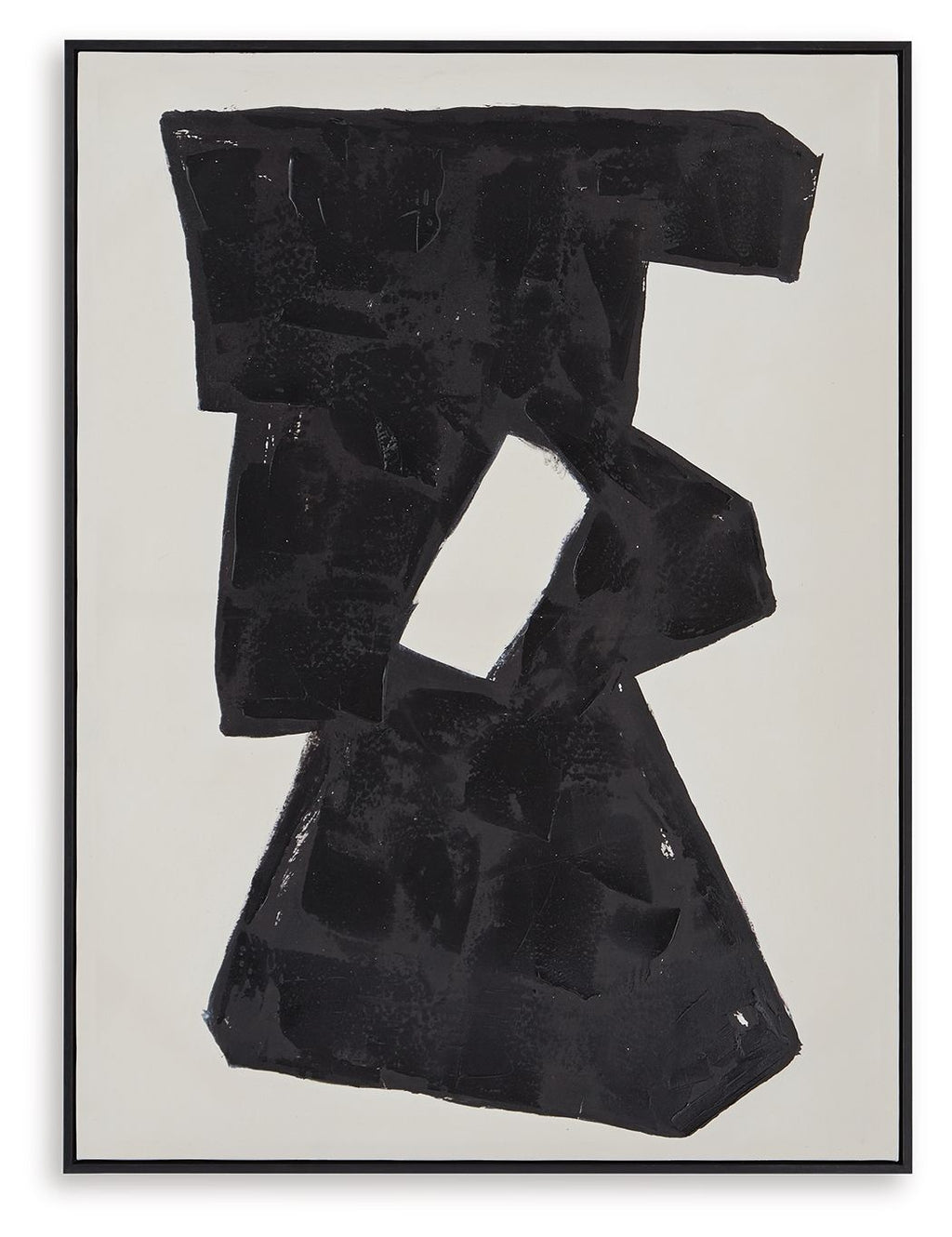Framed abstract wall art with dark black stacked shapes and a cutout center