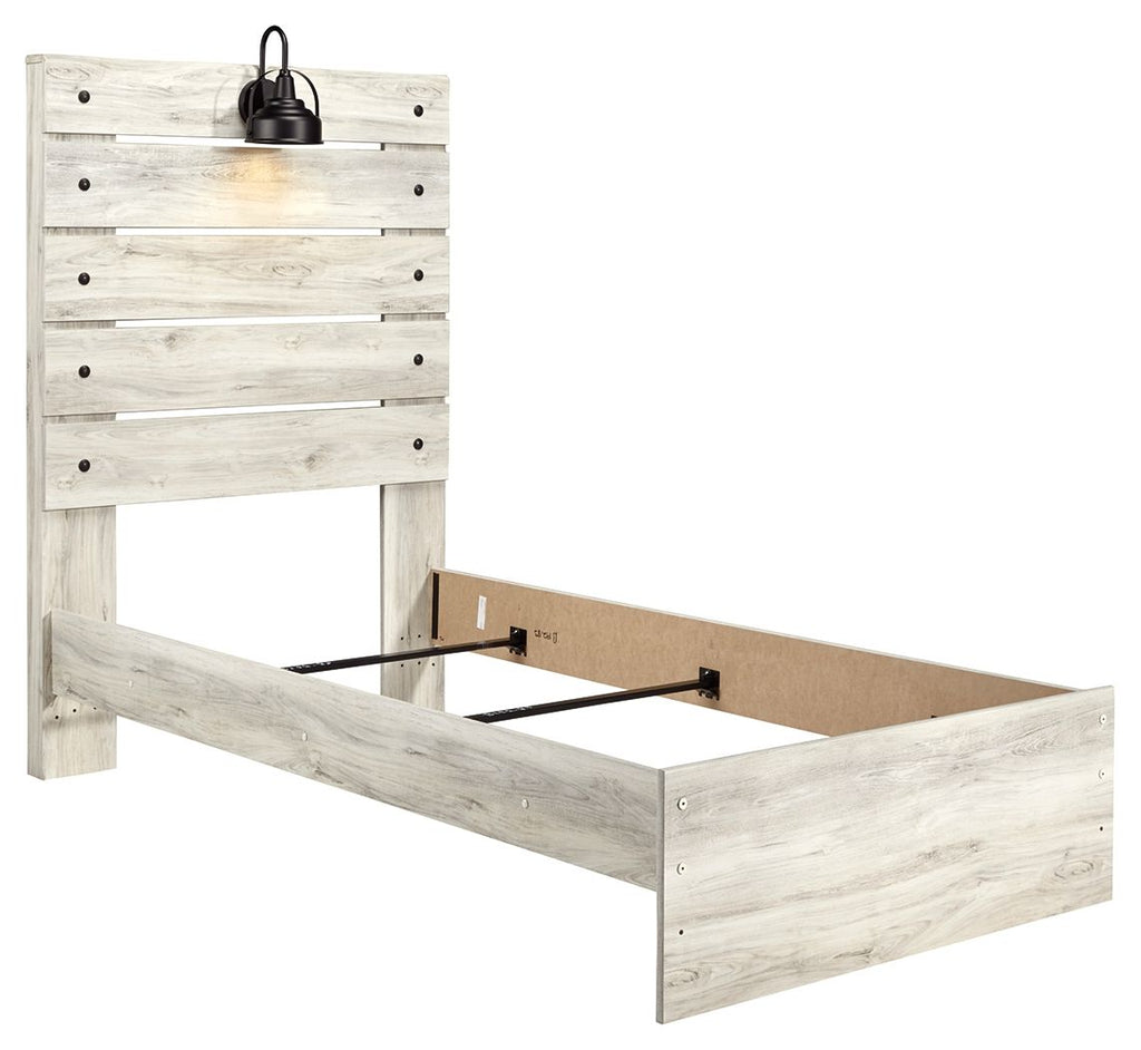 Light wood panel bed frame with open storage compartment and black pendant light fixture