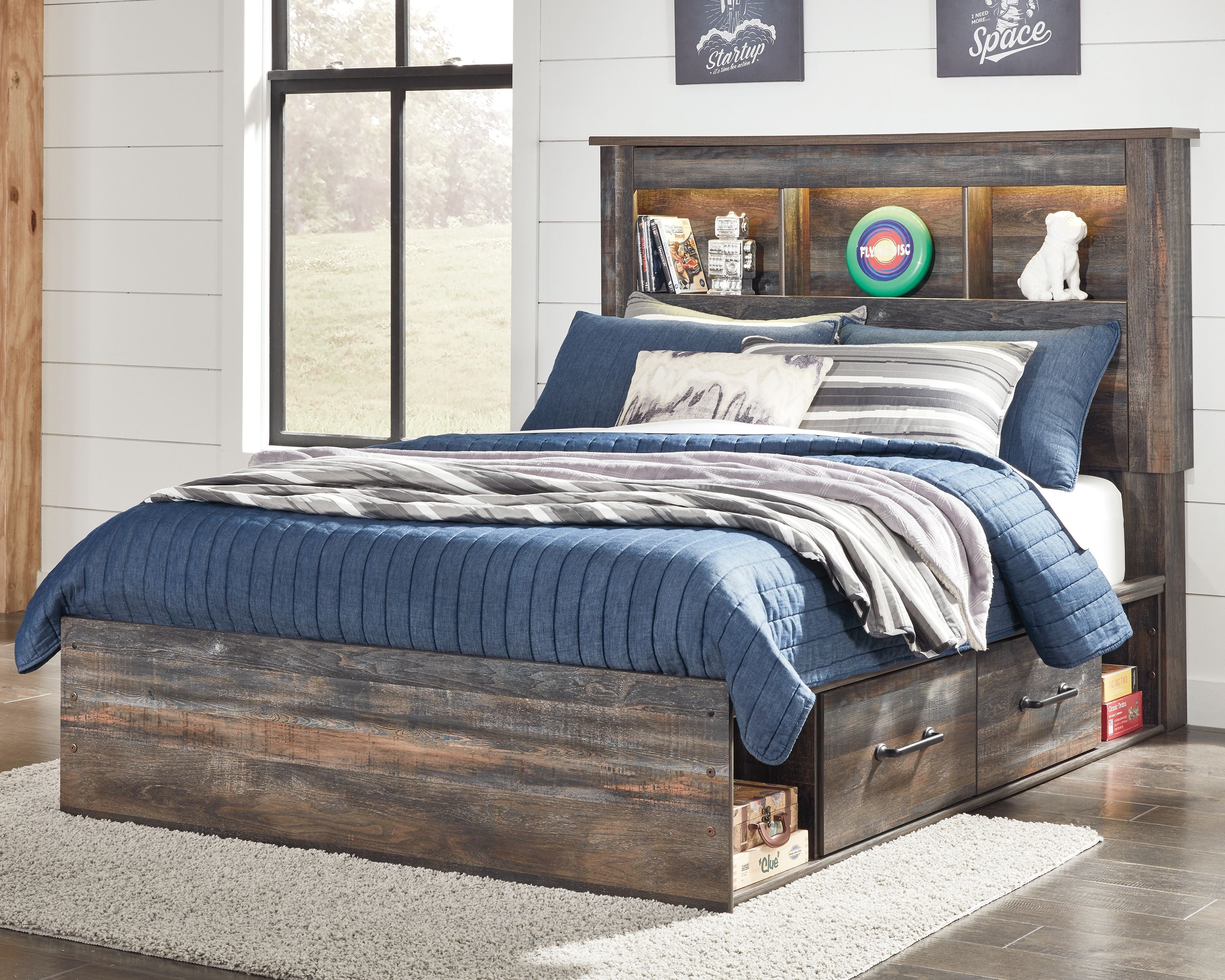 Panel bookcase bed with dark wood frame, open shelf headboard, and storage base drawers