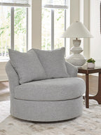 Pewter fabric swivel accent chair with two throw pillows