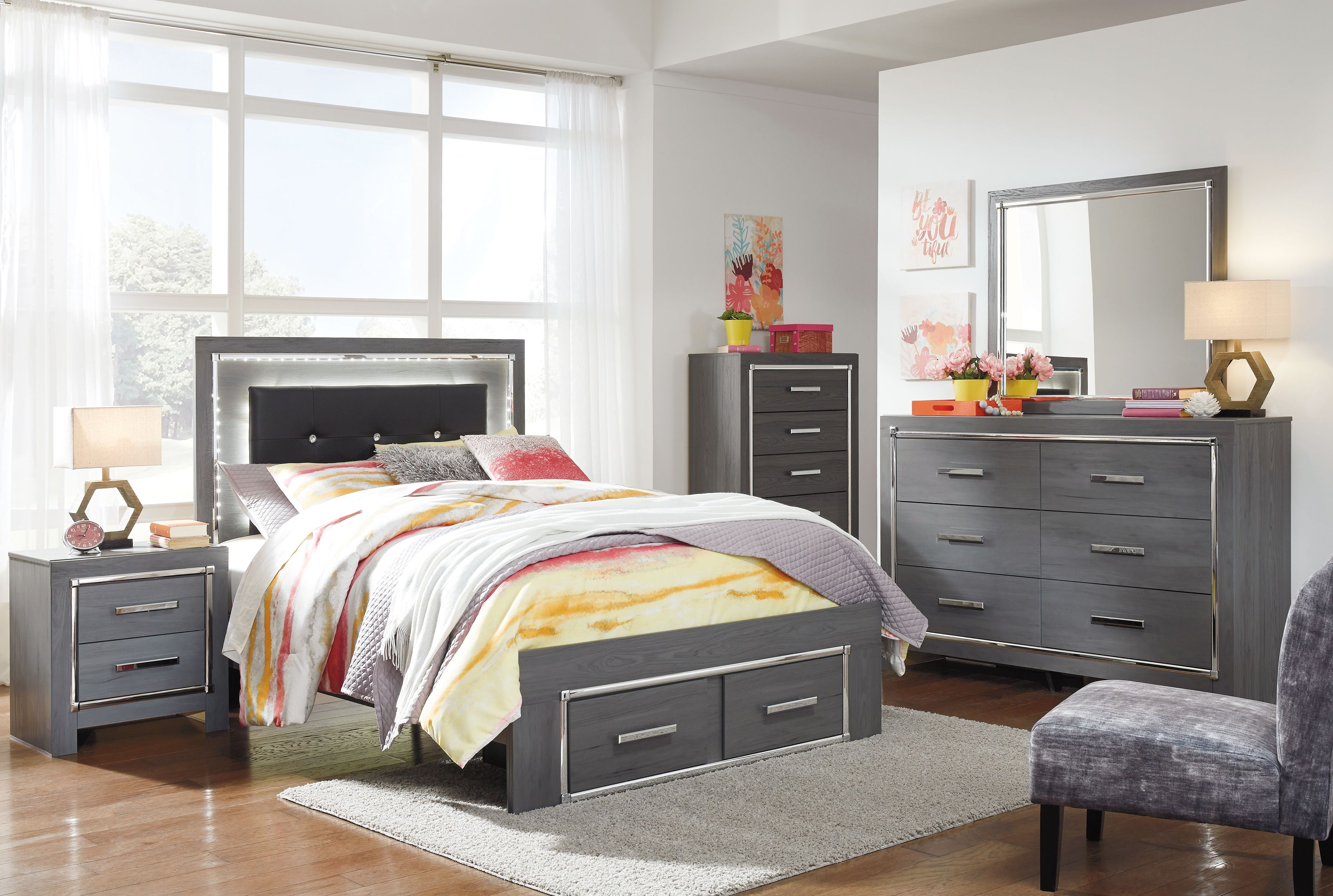 Youth panel bed in gray with side storage drawers and matching nightstand with drawers