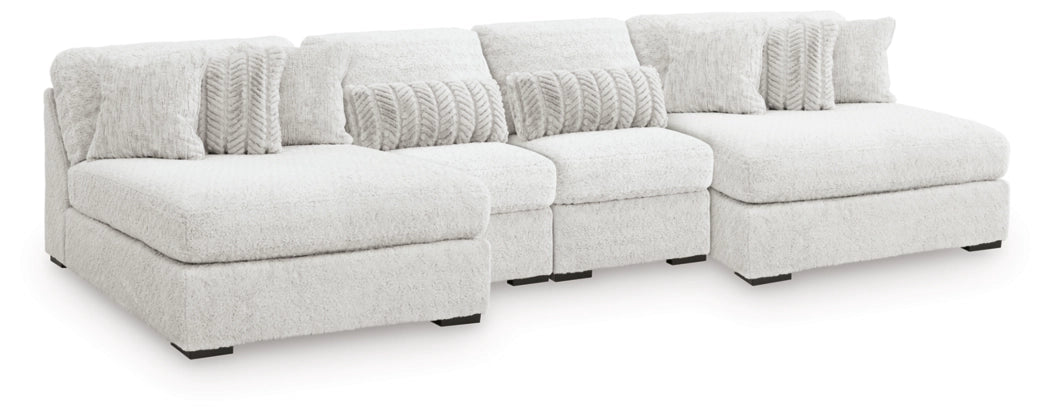 Light gray sectional sofa with chaise corner and textured back cushions