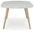 White oval dining table top view with tapered legs