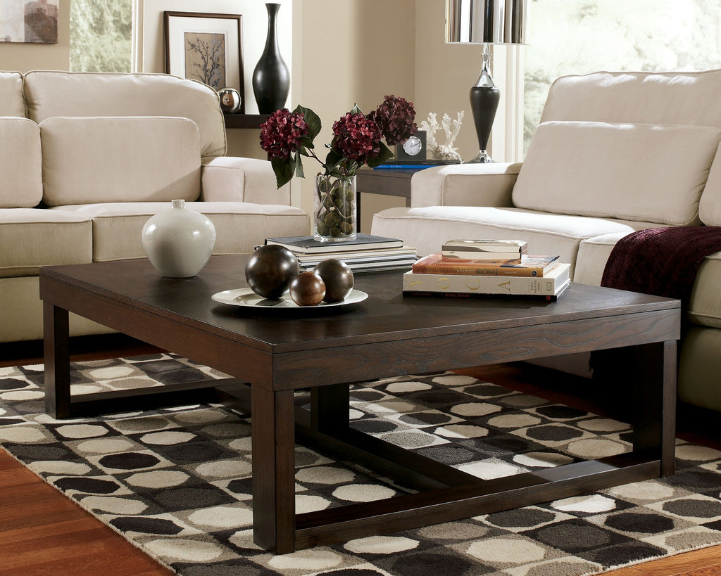 Dark brown rectangular cocktail table with lower shelf and square legs