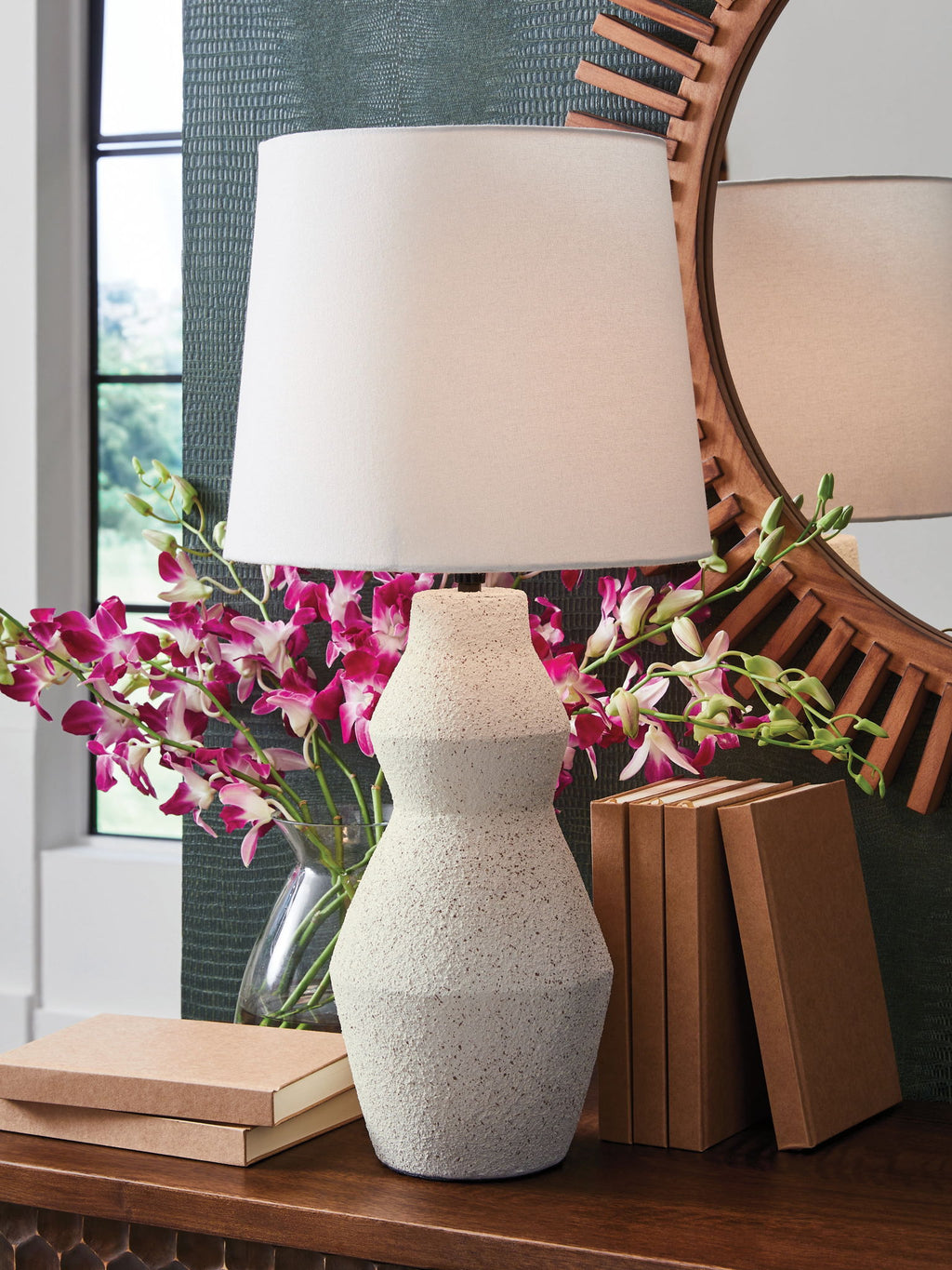 Cream table lamp with white fabric shade and speckled stone base