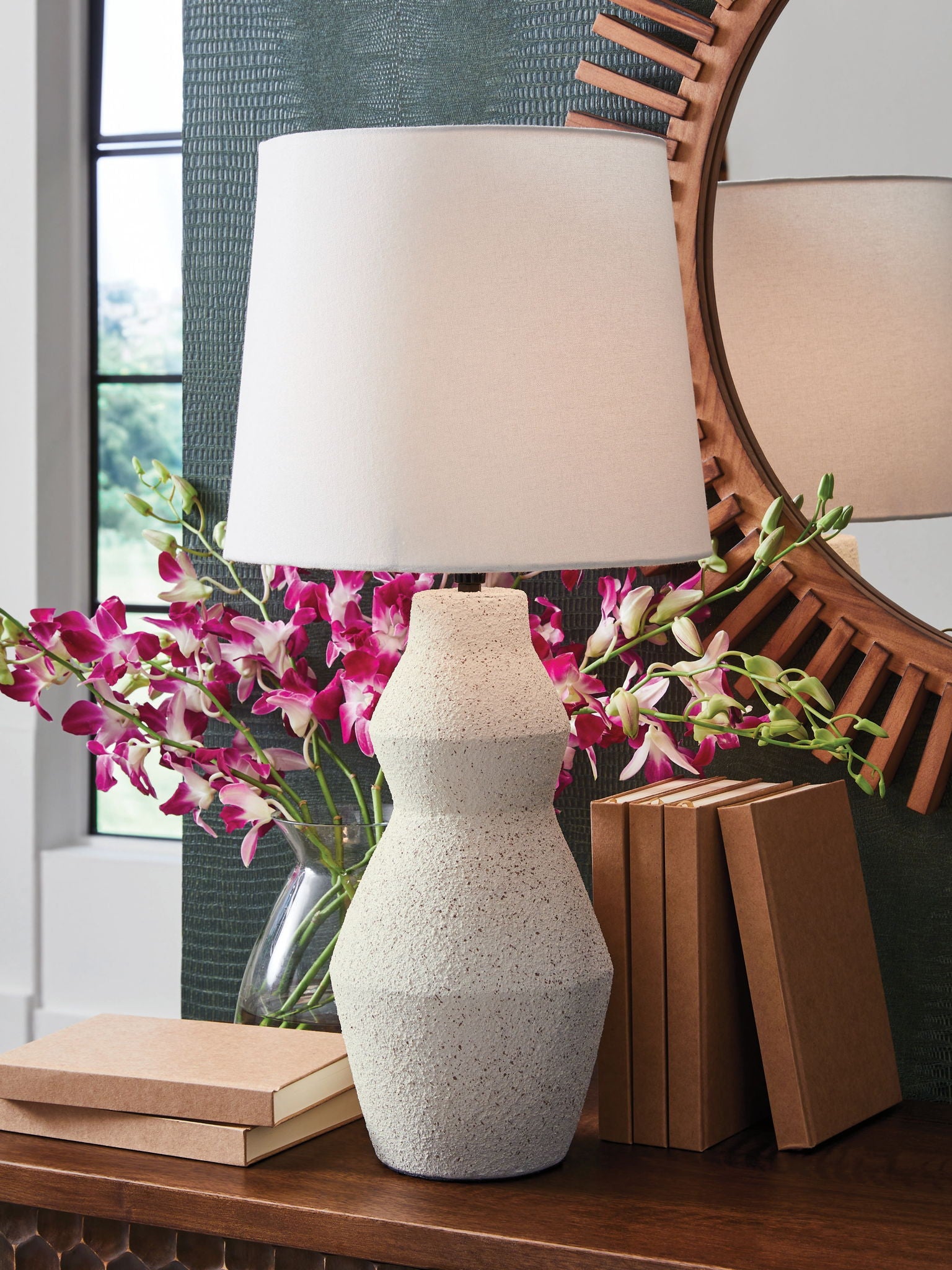 Cream table lamp with white fabric shade and speckled stone base