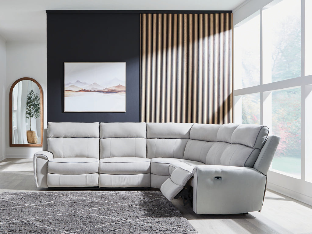 Light gray reclining sectional sofa with chaise recliner and cushioned arms