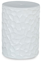 White textured stool with faceted pattern and rounded top