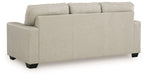 Beige sofa from side view with square arms, tufted backrest, and black legs