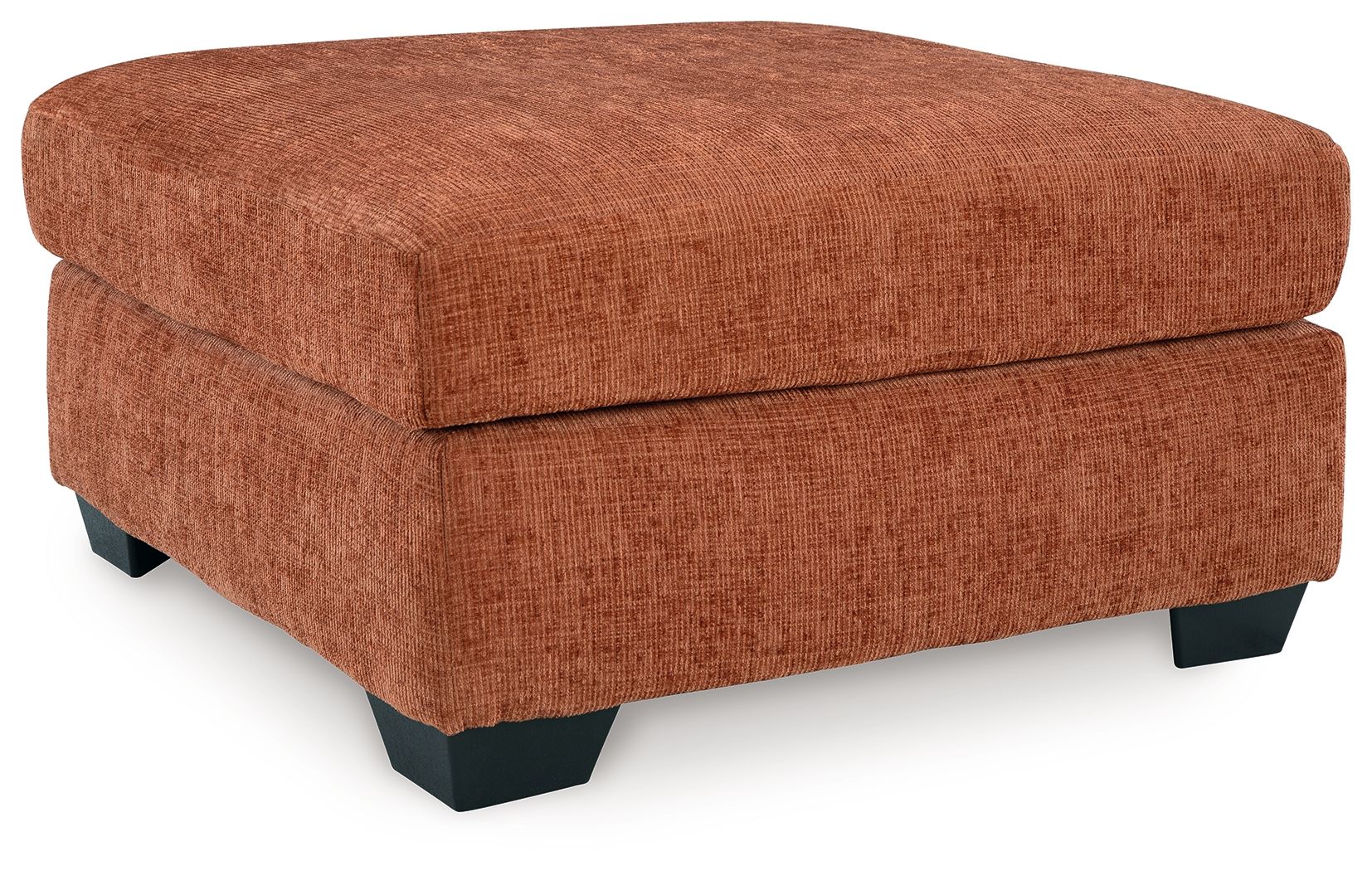 Rust-orange upholstered ottoman with cushioned square lid and dark block legs.