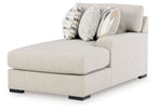Upholstered pebble right-arm corner chaise with patterned and solid pillows
