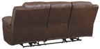 Chocolate-brown power reclining sofa with three back panels and padded side arms.