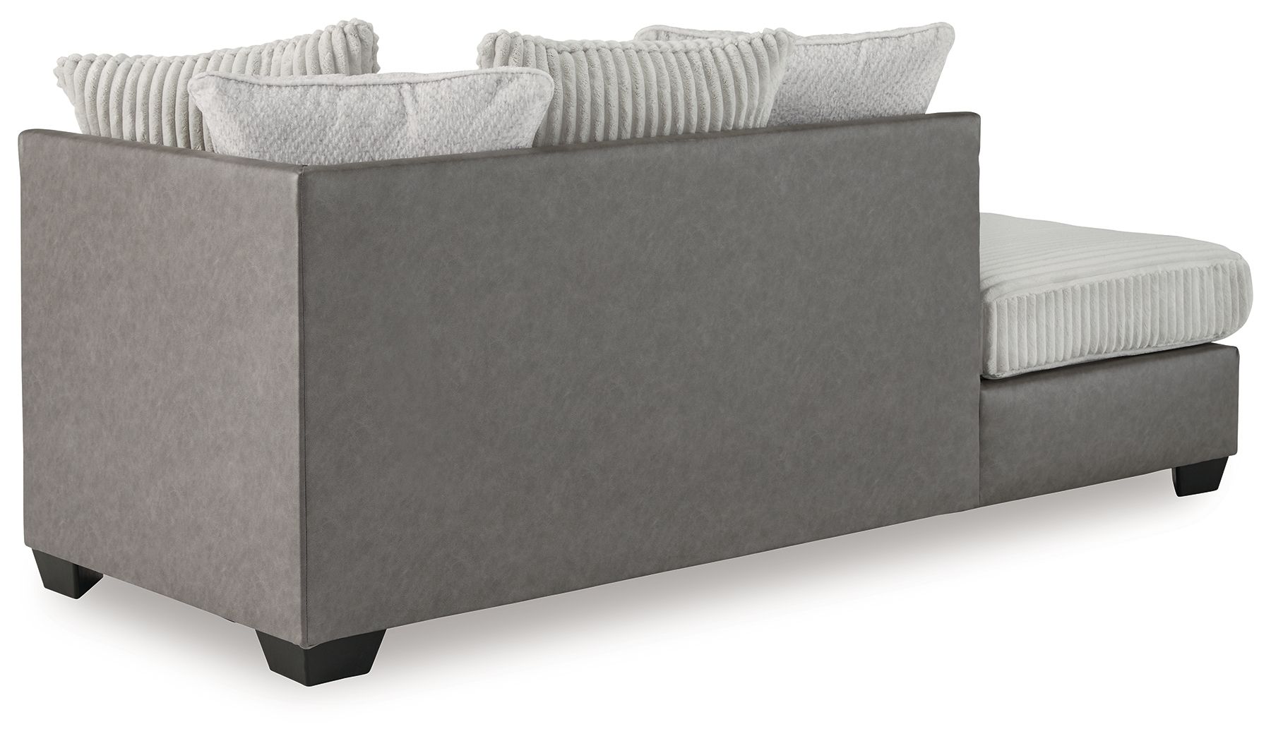 Corner chaise with dark gray base, ribbed light cushions, and stacked throw pillows