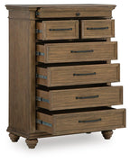 Medium brown wooden chest of drawers with seven drawers, partially pulled out, bar handles