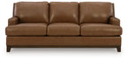 Saonara sofa in amber with three seat cushions, squared arms, and stitched skirt