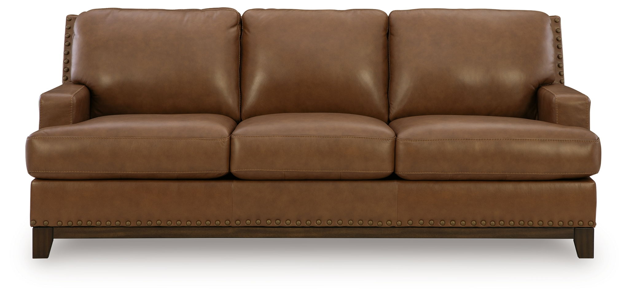 Saonara sofa in amber with three seat cushions, squared arms, and stitched skirt