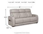 Gray power reclining sofa with adjustable headrests, 86" width and 38.5" depth