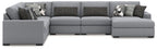 Gray sectional sofa with chaise ends and decorative patterned throw pillows