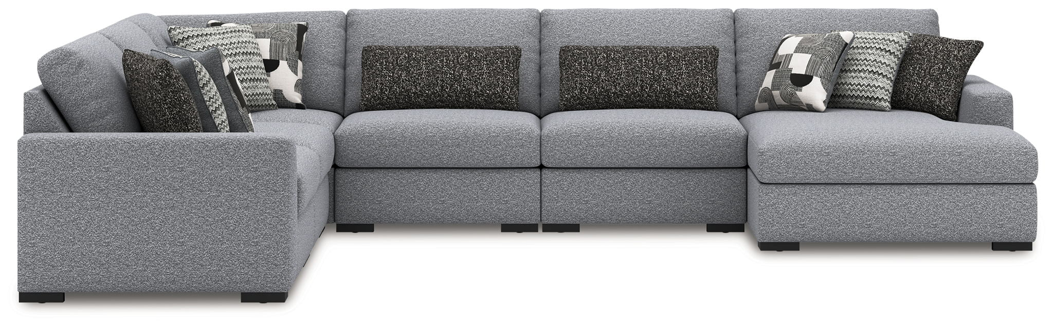Gray sectional sofa with chaise ends and decorative patterned throw pillows