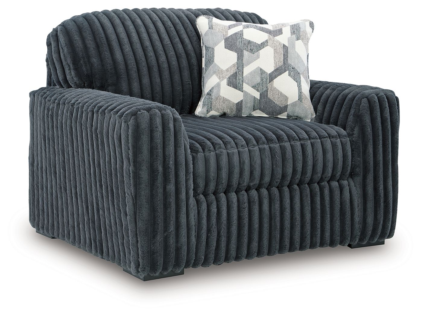 Dark gray chair and a half with patterned pillow on the seat