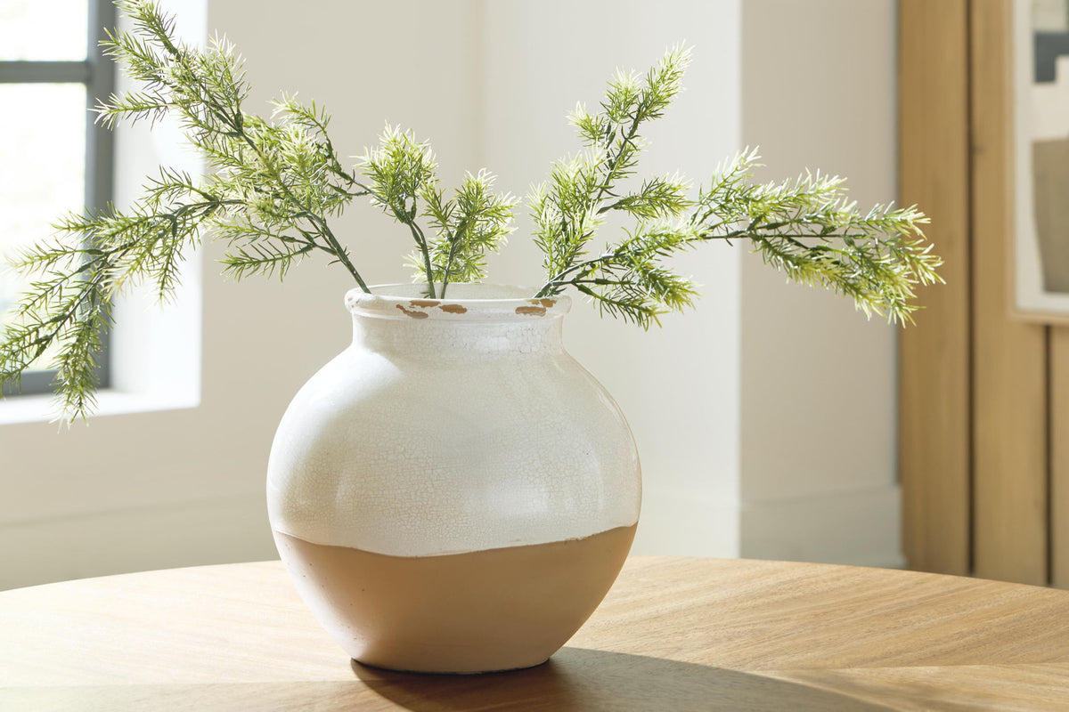 Vercott white ceramic vase with crackle glaze holding green stems on a tabletop
