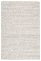 Beige Jossick woven rug, flat textured surface, straight edges